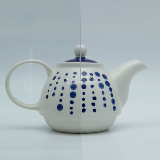 a tea kettle with and without clear glass