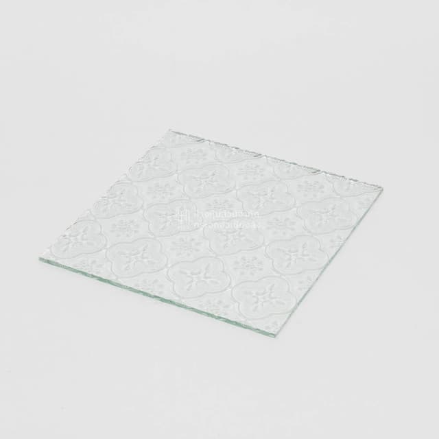 a sheet of clear floral patterned glass