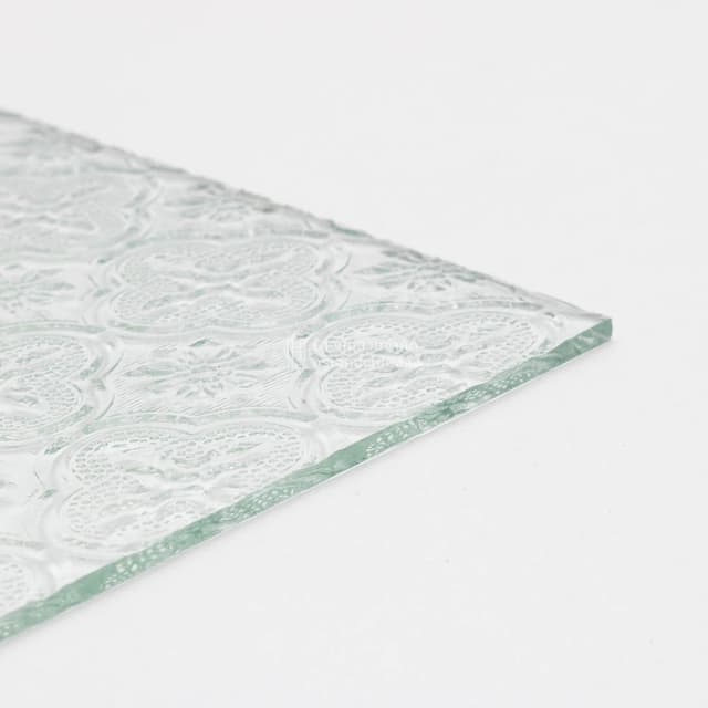 a sheet of clear floral patterned glass