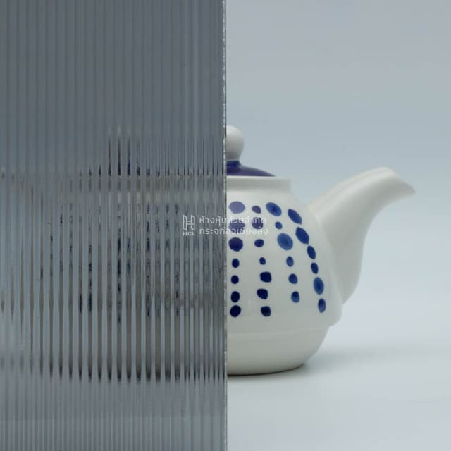 a tea kettle with and without grey small moru patterned glass