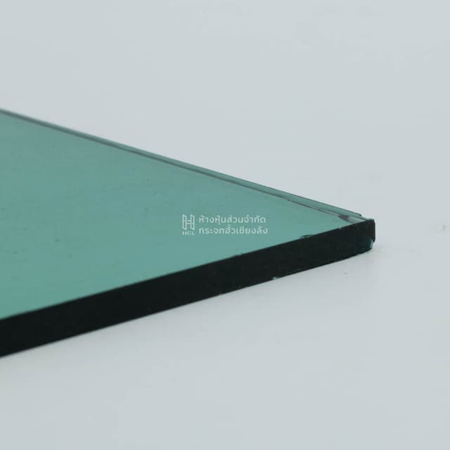 edge of sheet of darkgreen glass