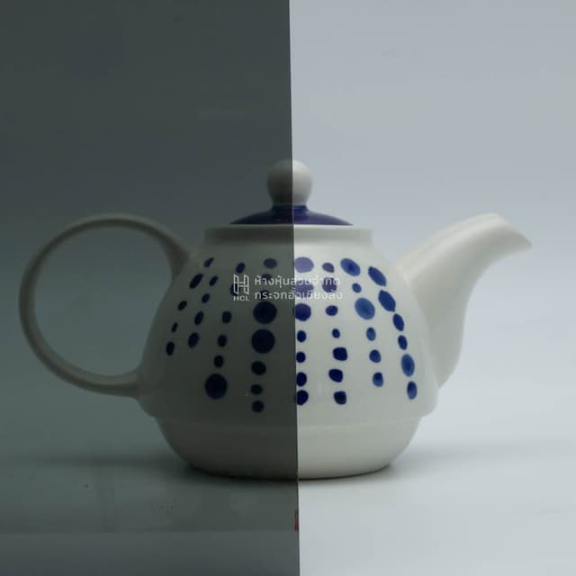 a tea kettle with and without darkgrey glass